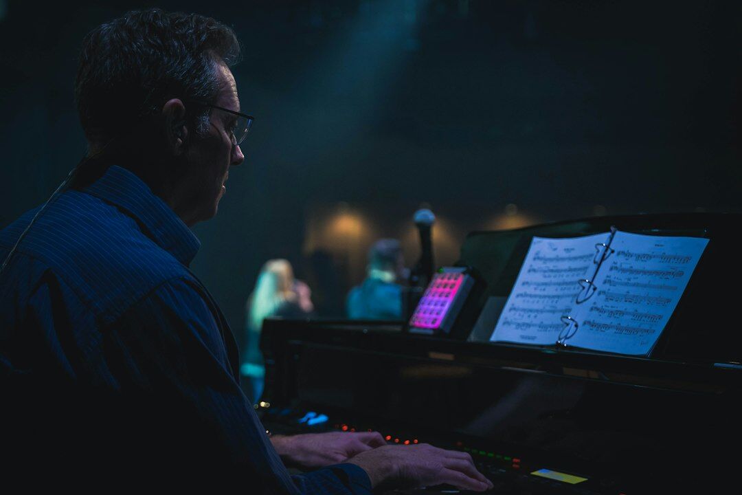 Producer and technical director reviewing a live broadcast run sheet